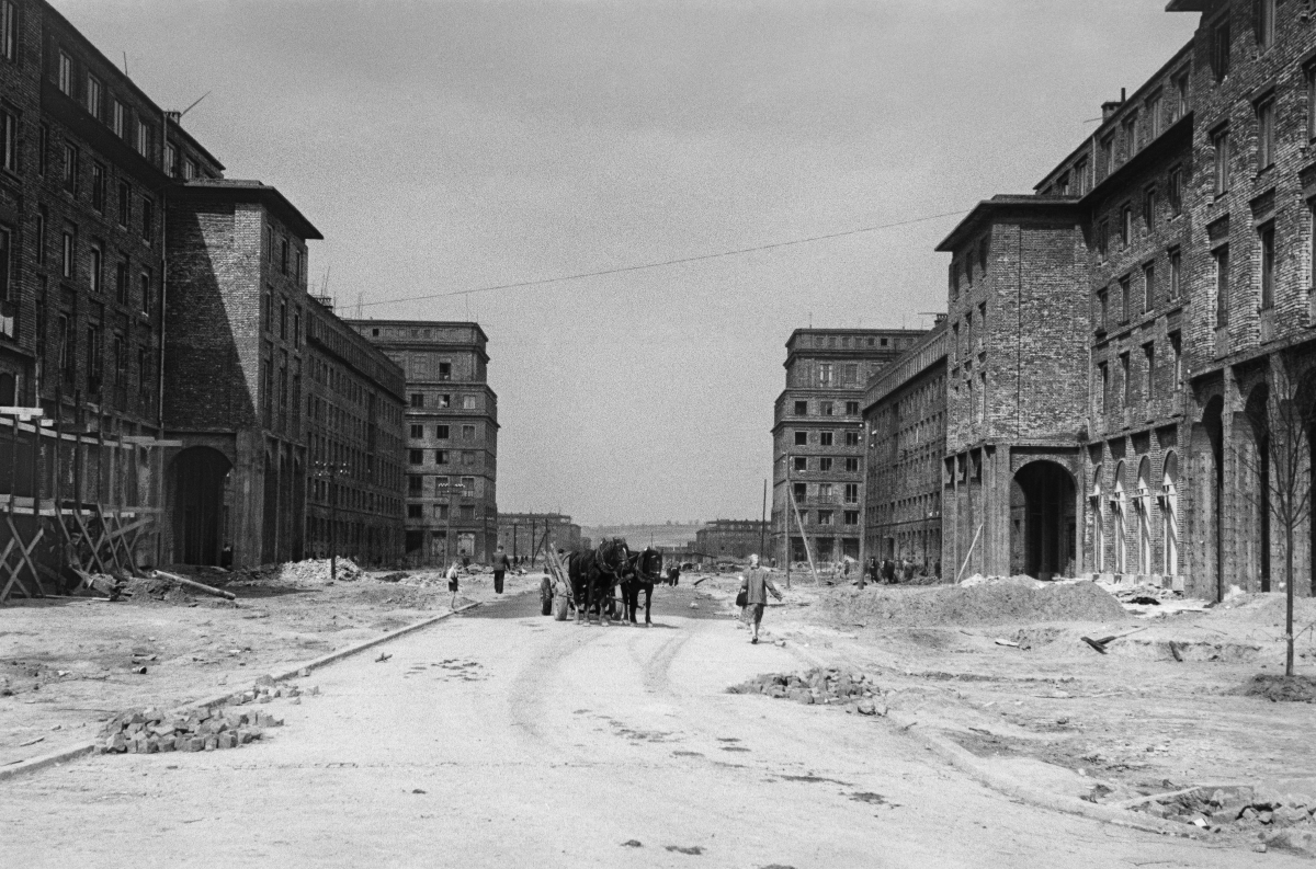 A view of the excavated, spacious square between the buildings under construction.