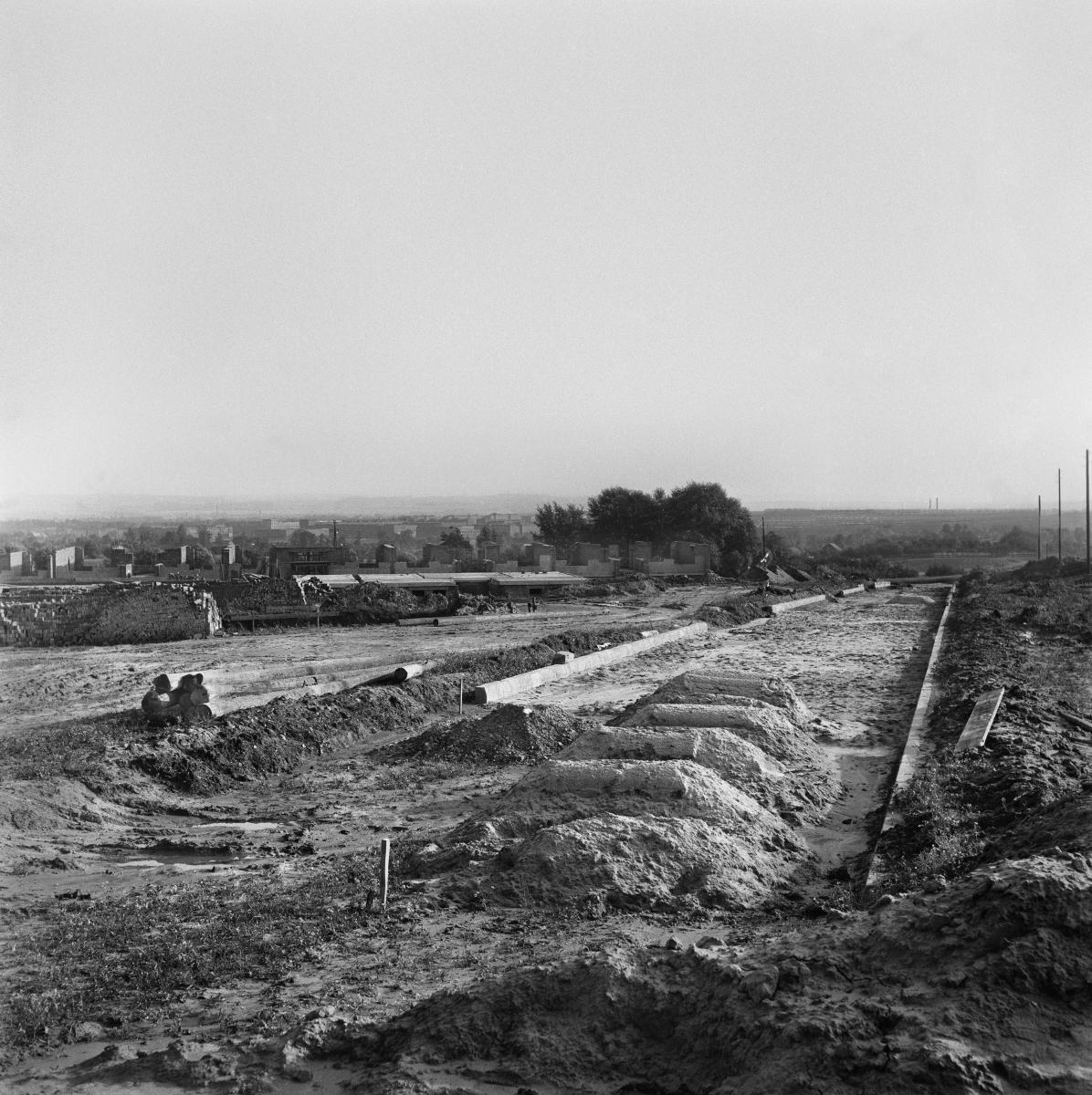Road construction, on the sides of the field.