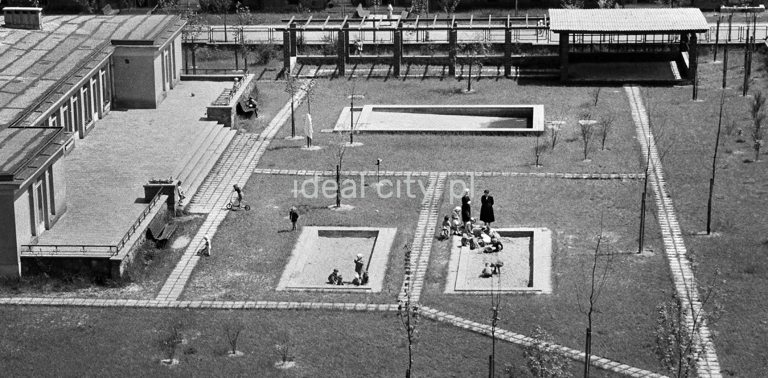 Top view of the playground in front of the kindergarten building.