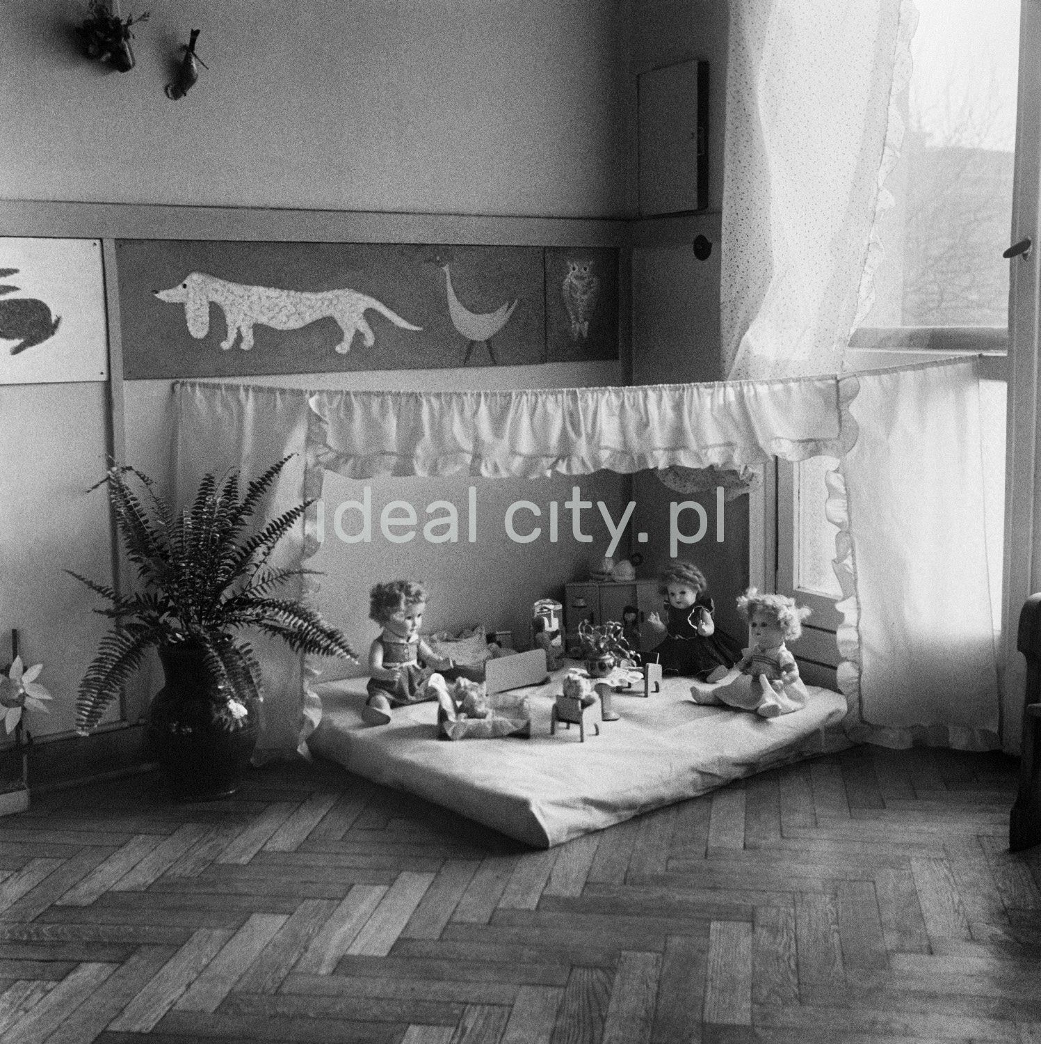 A shot at the play corner with dolls.