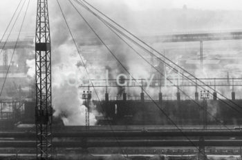 Lenin Metallurgical Combine, fragment of steelworks infrastructure, conveyors for moving ores, coke and other materials in the background. Early 1960s.

Kombinat metalurgiczny im. Lenina, fragment infrastruktury huty, w tle widoczne taśmociągi do transportu rudy, koksu i innych materiałów, początek lat 60.

Photo by Henryk Makarewicz/idealcity.pl